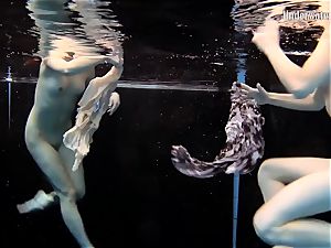 two dolls swim and get naked uber-sexy