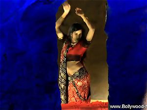 Indian dark haired Dance Gracefully